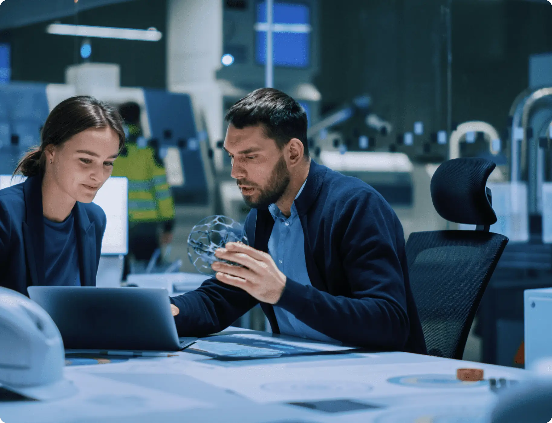 GettyImages-1357436779 A man and woman looking at a laptop